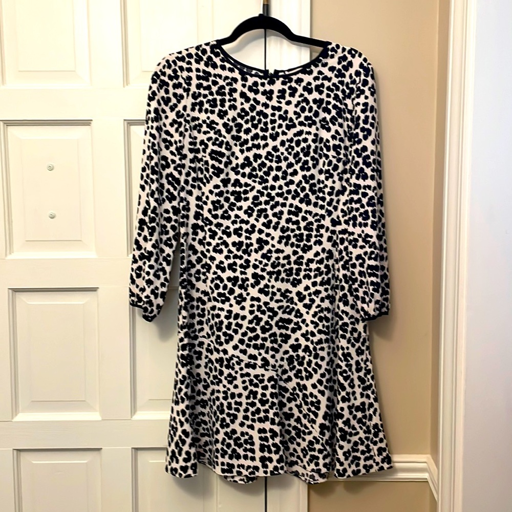 Loft brings Dalmatian look in a classy dress with billowy sleeves & flip skirt